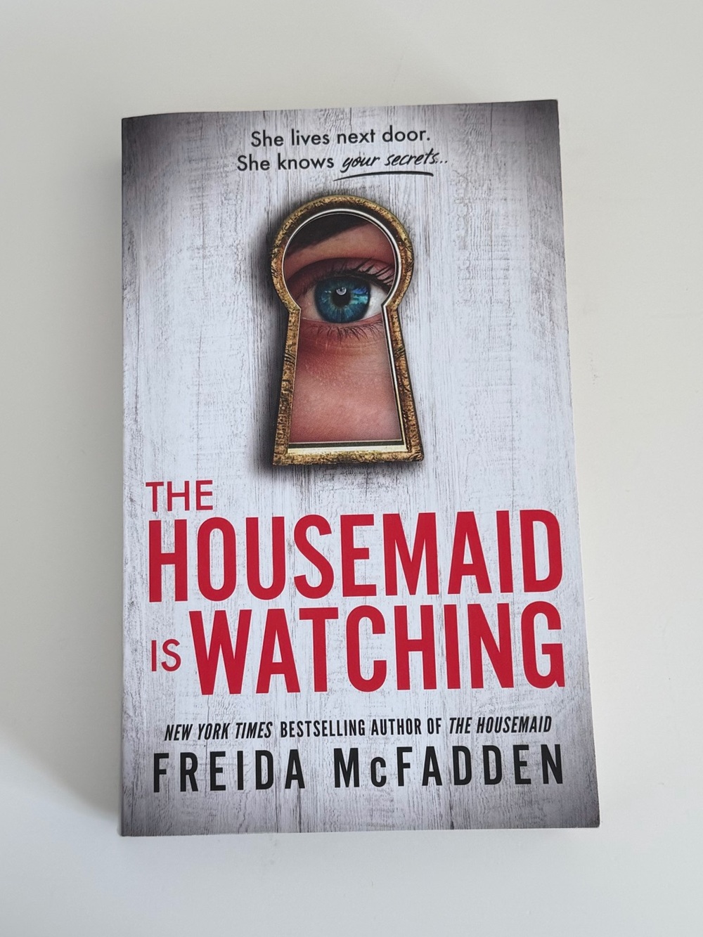 The Housemaid Is Watching - White Cover